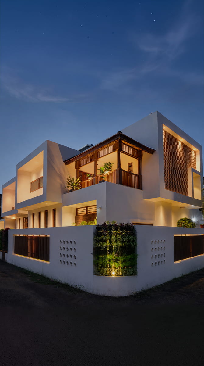 Striking cantilevered modern home exterior with warm timber and exposed concrete